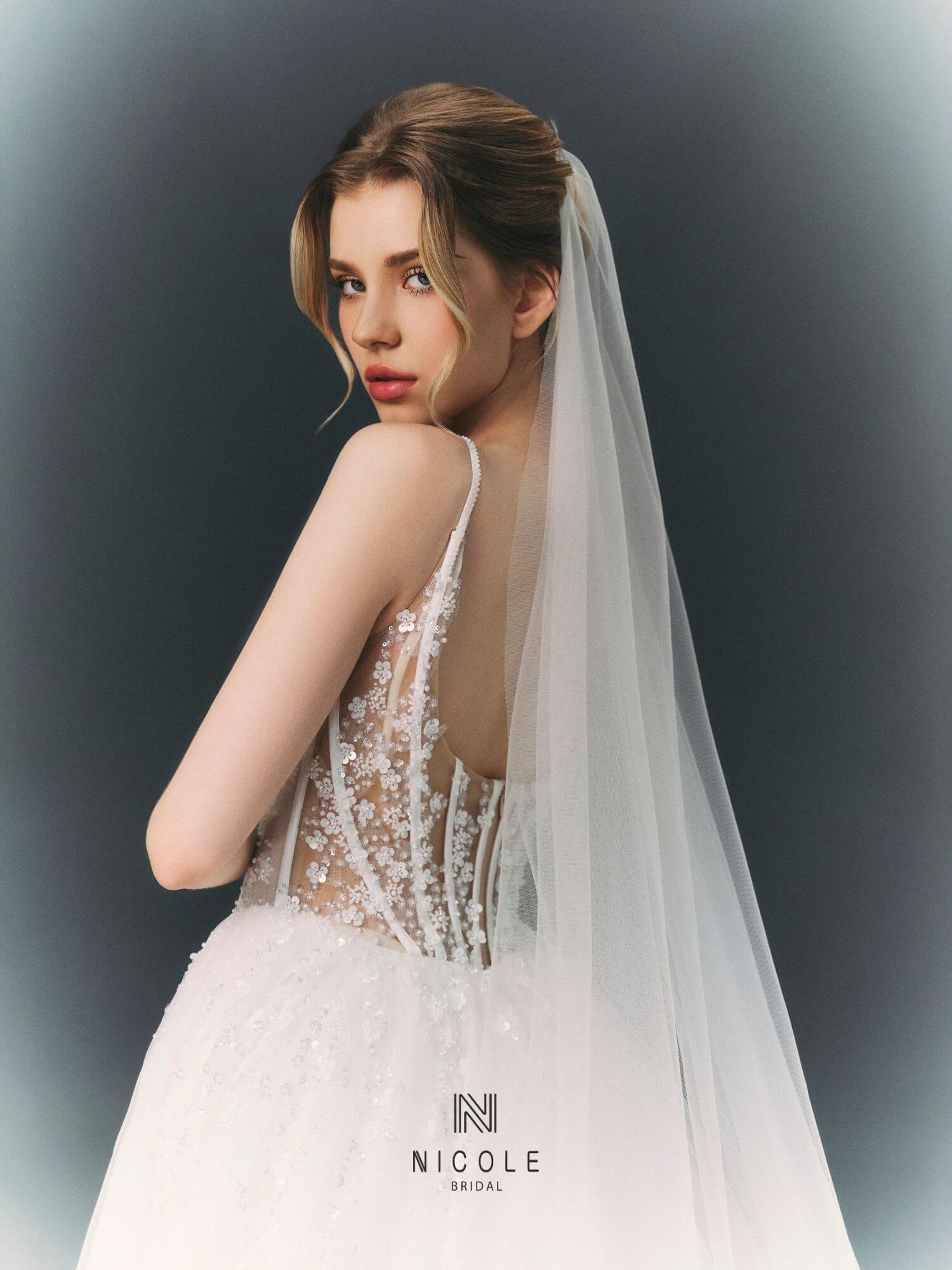Nicole Bridal - Váy cưới hở lưng hình 2