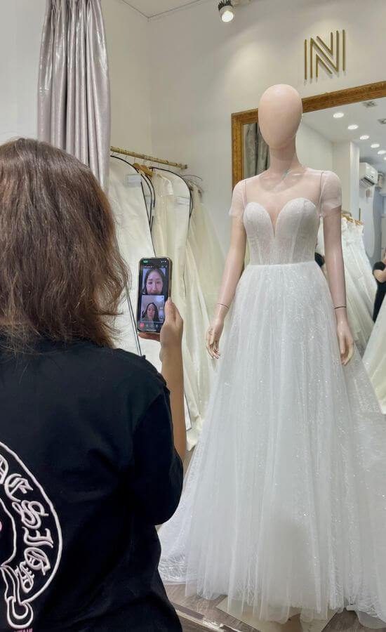 Our staff is meeting online with customers about wedding dress ideas