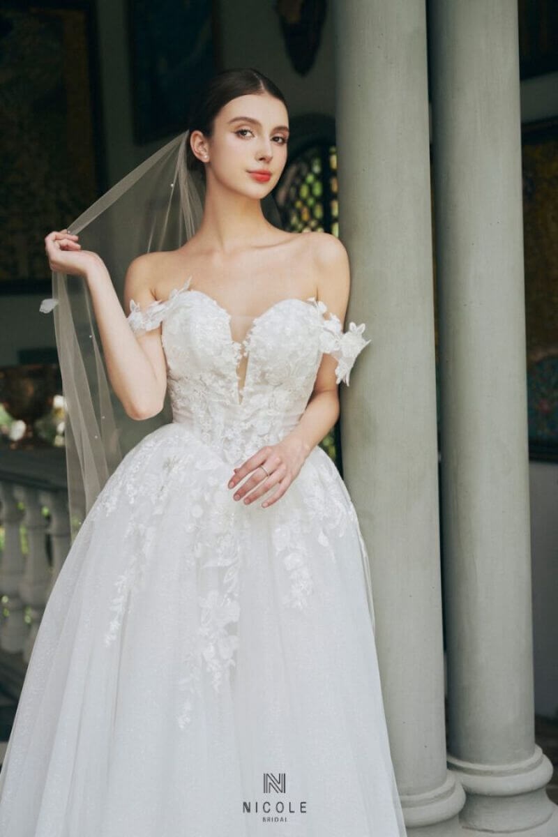 The gentle and delicate Hilda wedding gown