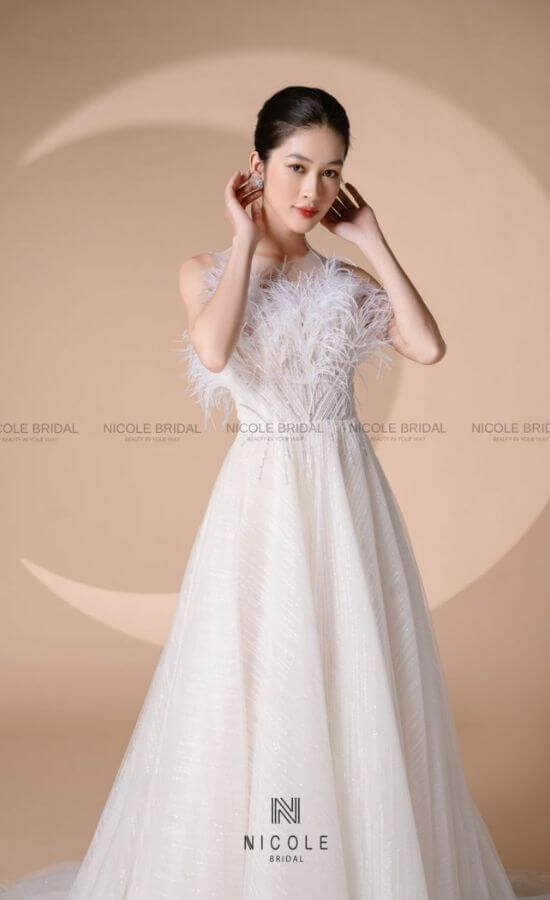 Wedding dress with feathers